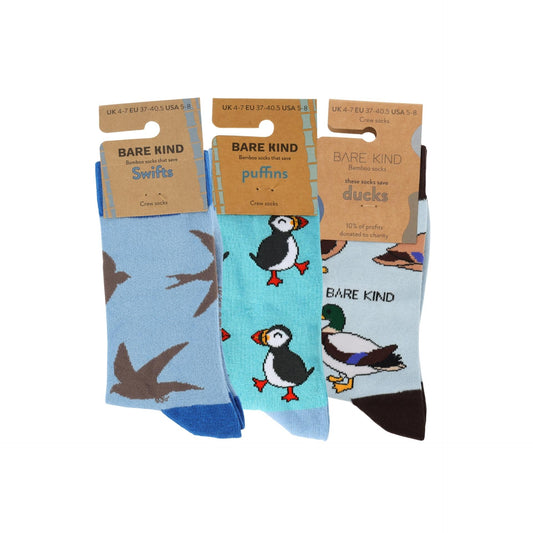Three pairs of socks with animal designs and 'Bare Kind' branding on a white background.