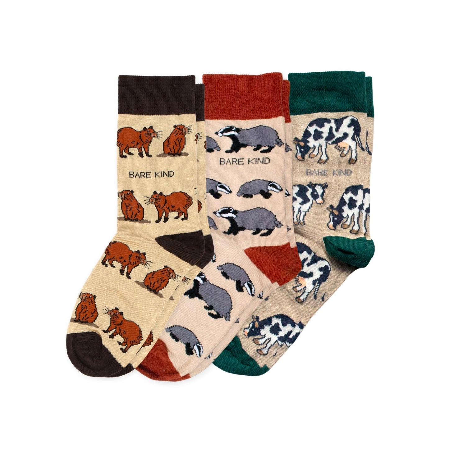flat lays of Capybara, Badger, Cow bamboo socks