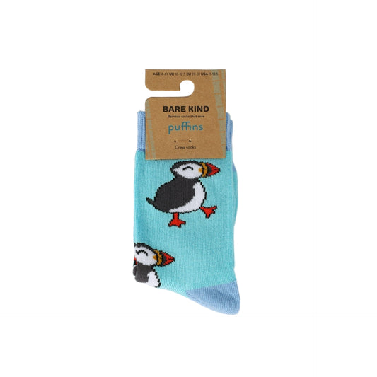 Pair of socks with puffin design and Bare Kind packaging on a light gray background