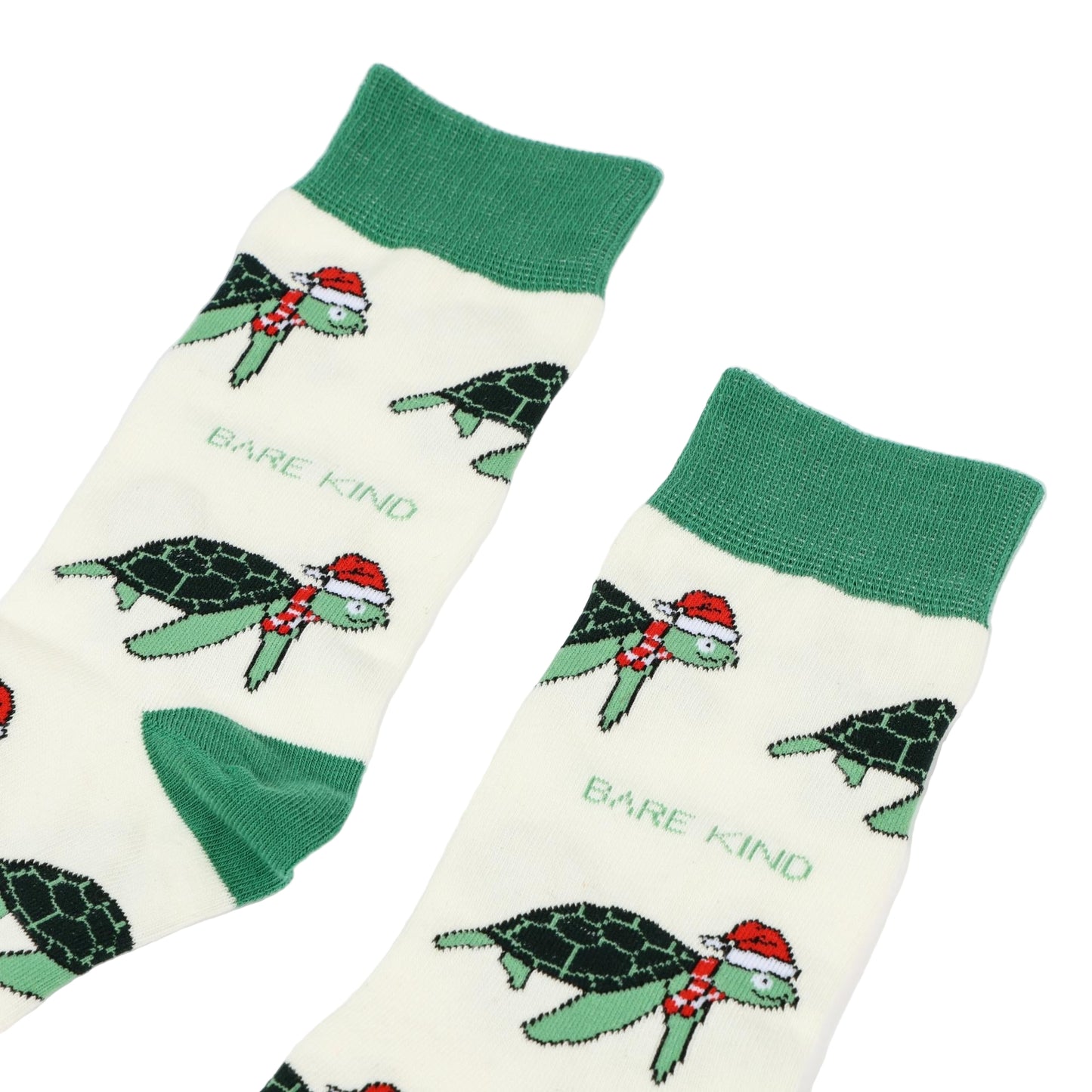 Pair of socks with turtle designs and 'Bare Kind' text on a white background