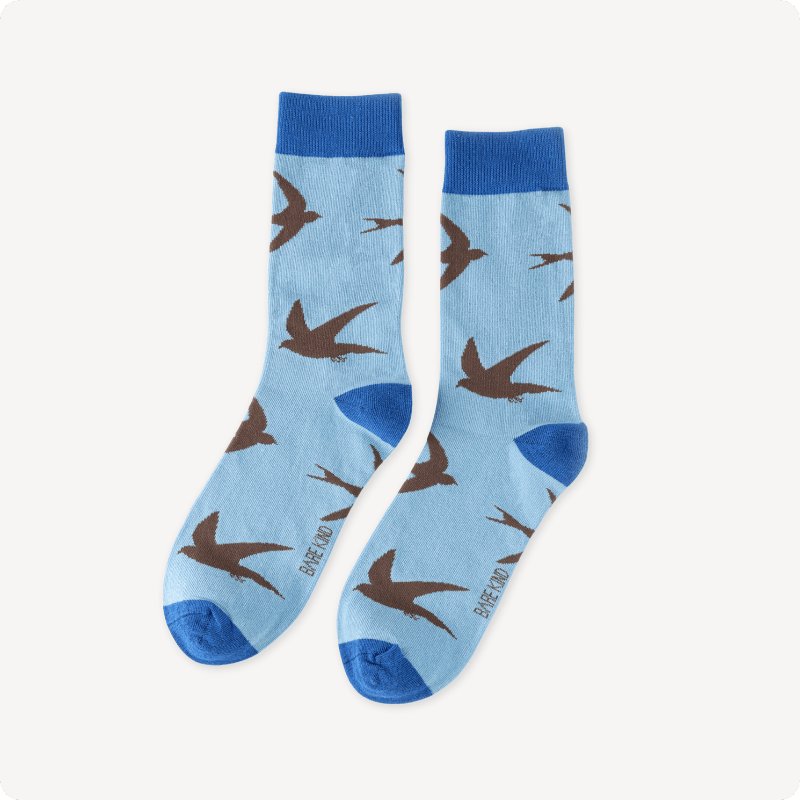 Blue socks with swift pattern on a white background