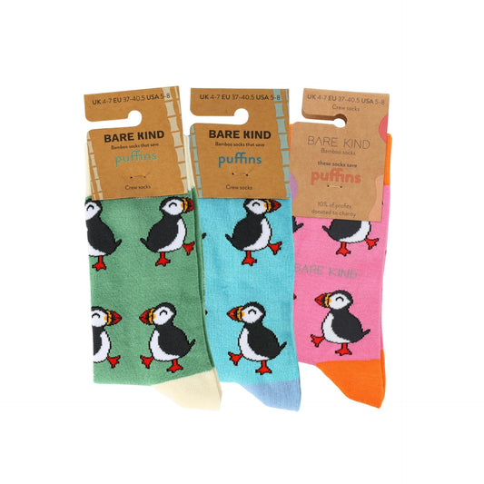 Three pairs of socks with puffin design packaging, labeled 'Bare Kind'.
