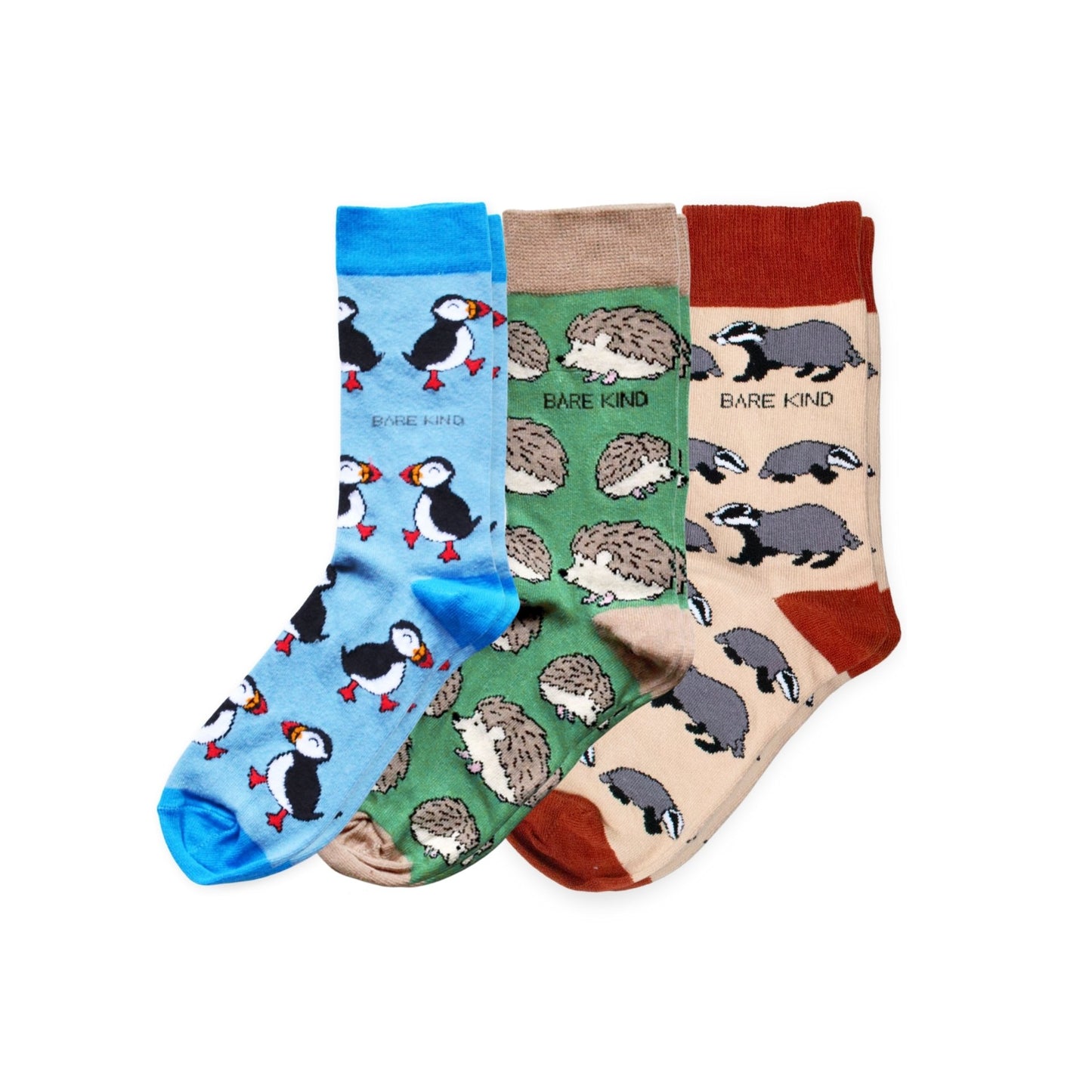Three pairs of socks with animal patterns on a white background