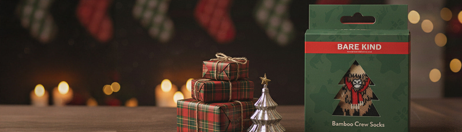 Bare Kind bamboo crew socks packaging with Christmas-themed background