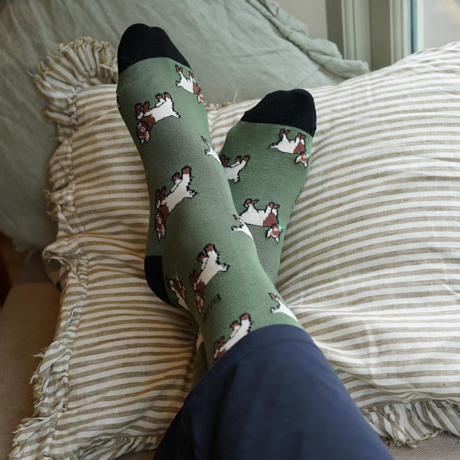 model wearing green goats bamboo socks