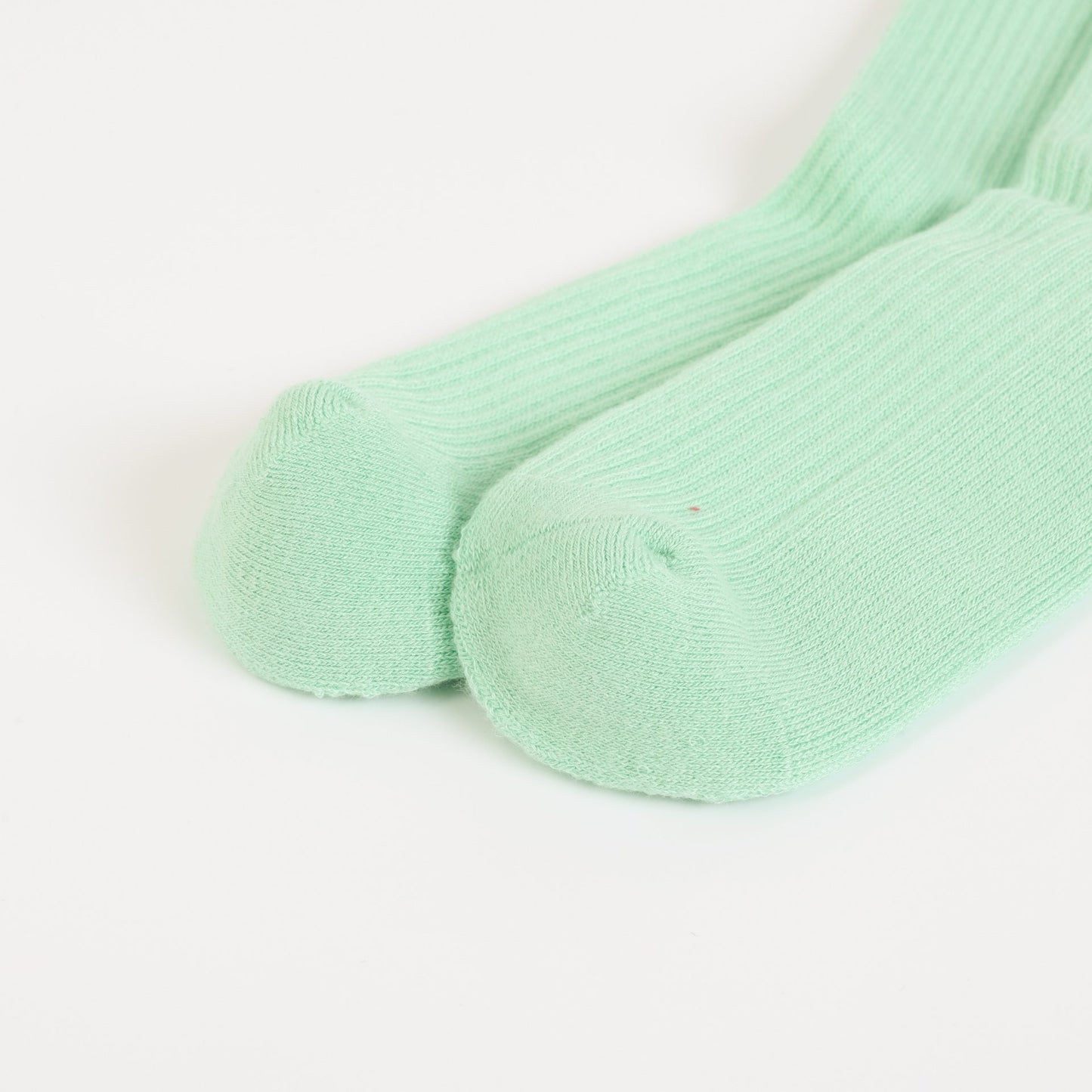 flat lays of green hedgehogs ribbed bamboo socks