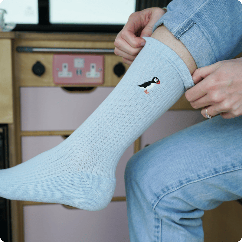 Model wearing Puffin socks