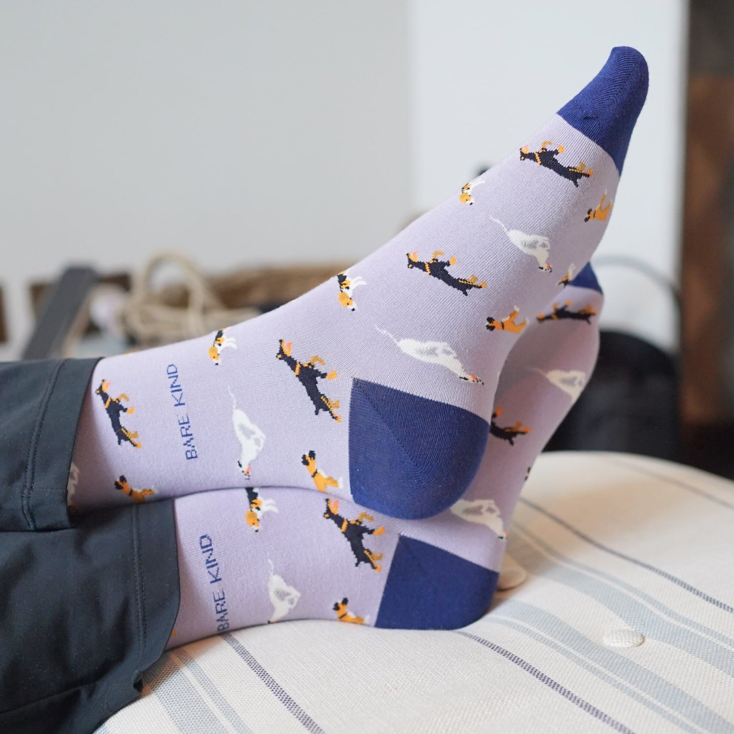 model wearing purple dog bamboo socks