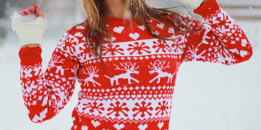 woman wearing red white Christmas jumper