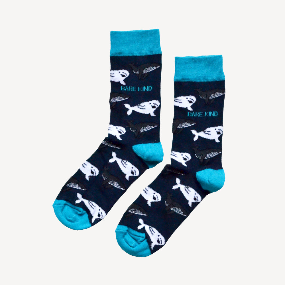 small fish swim in the deep blue ocean as you explore ocean animal socks