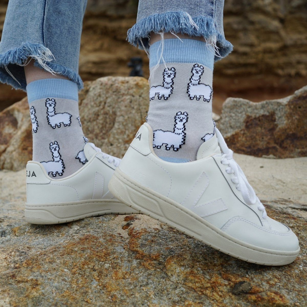 model wearing grey blue alpaca bamboo socks