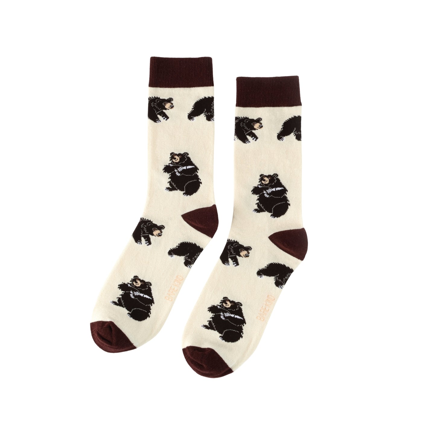 Pair of socks with bear pattern on a white background