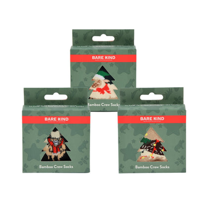 Three packages of Bare Kind Bamboo Crew Socks arranged in a pyramid on a plain white background. The packaging features a dark green camouflage pattern with a red band containing the white text 'BARE KIND'.