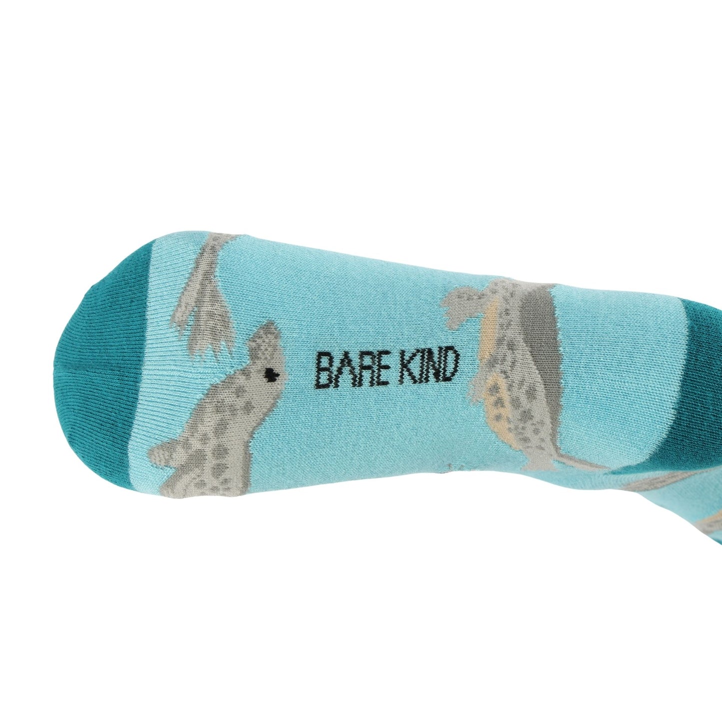 blue socks with seal pattern on a light blue background