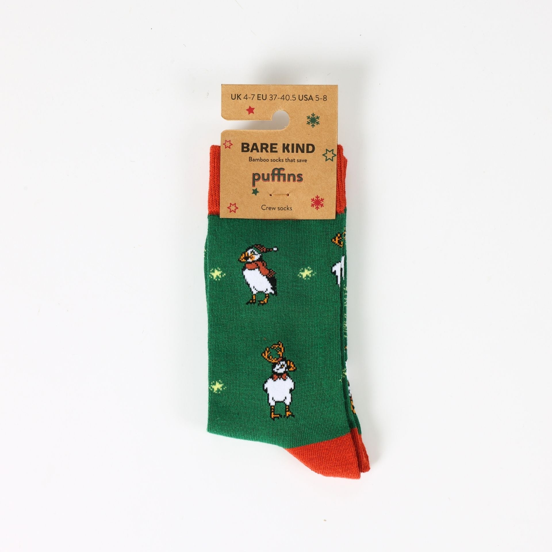 Green socks with puffin design on a white background, featuring Bare Kind branding.