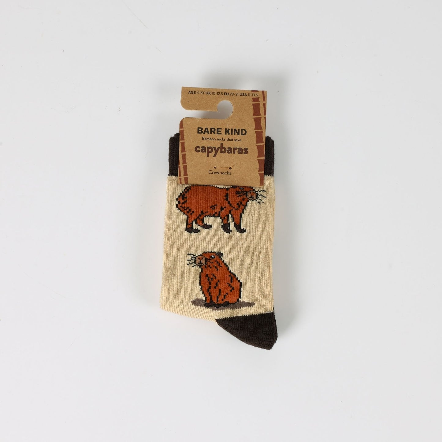 Capybara-themed socks with packaging on a white background