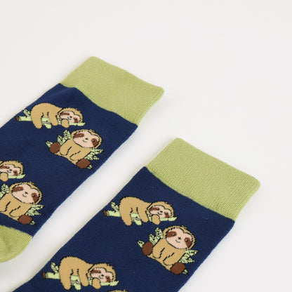 Pair of blue sloth bamboo socks on a white background