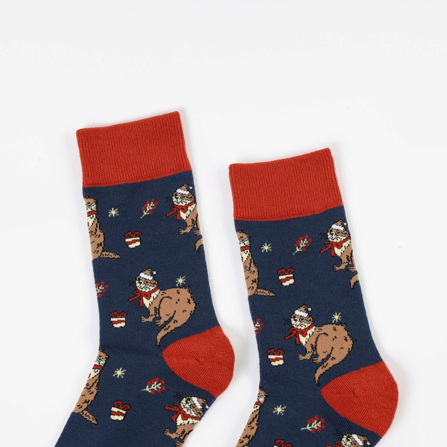 Pair of Otter Christmas socks on a white background