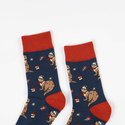 Pair of Otter Christmas socks on a white background