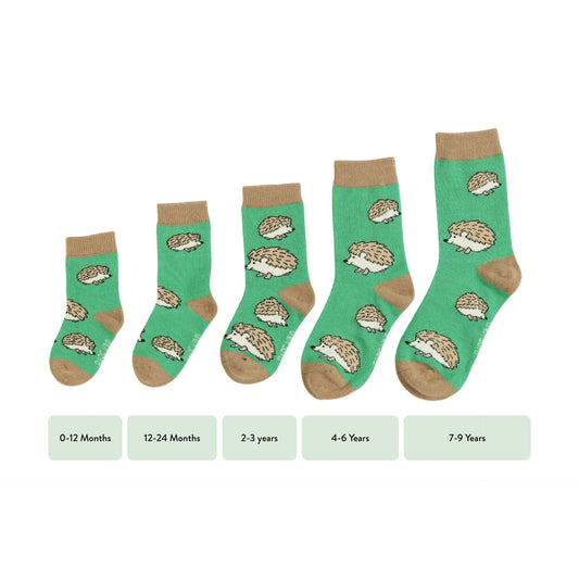 Set of green socks with hedgehog pattern and size indicators on a white background