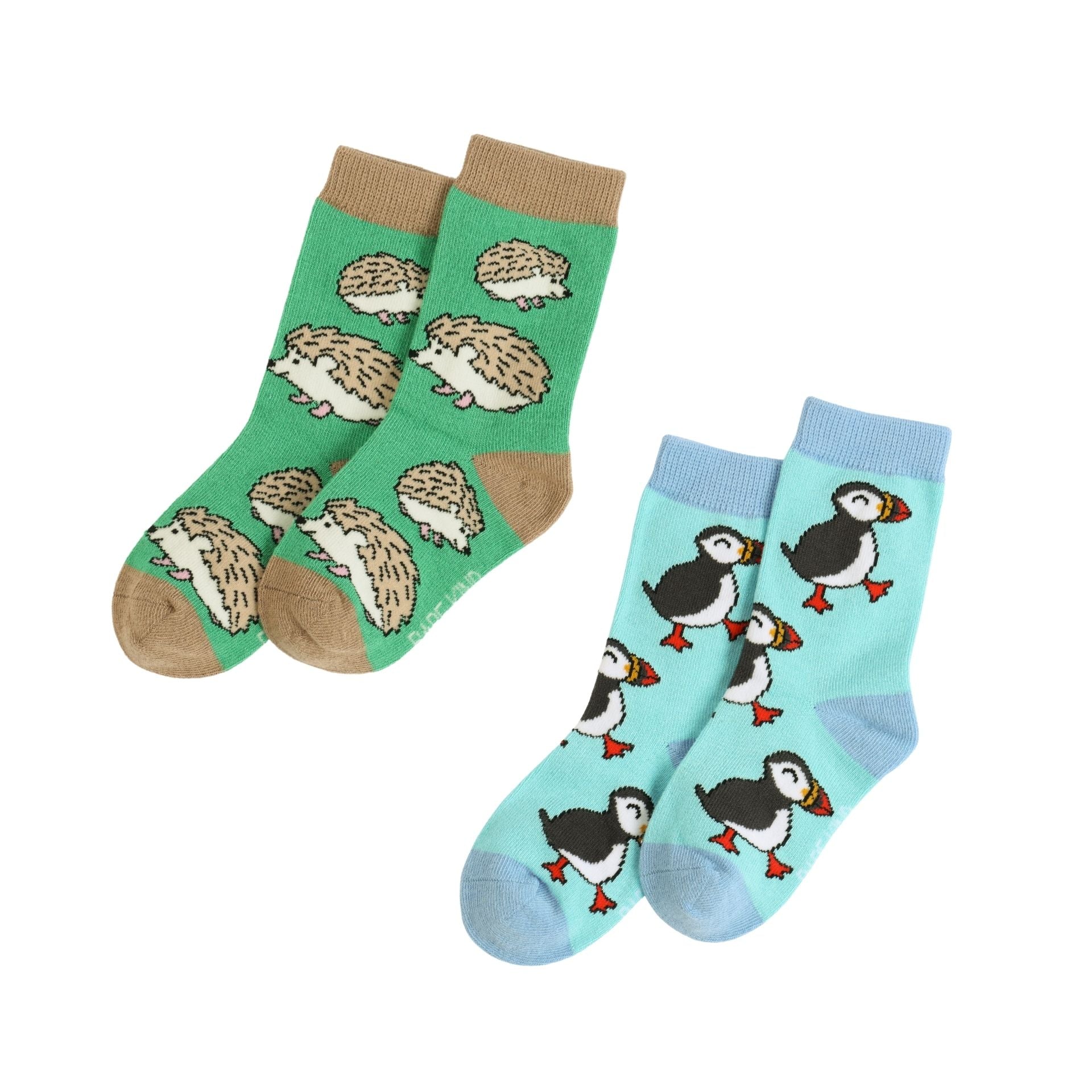 Two pairs of socks with hedgehog and puffin designs on a white background