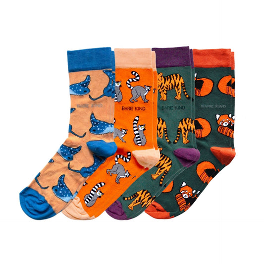 flat lays of orange rays, lemur, tiger and red panda bamboo socks