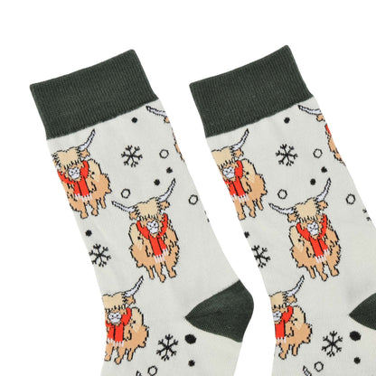 Flat lays white Christmas highland cows