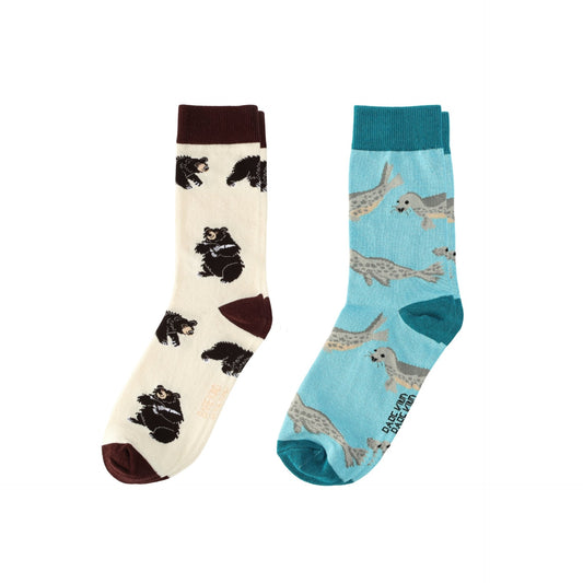 Two pairs of socks with animal patterns on a white background