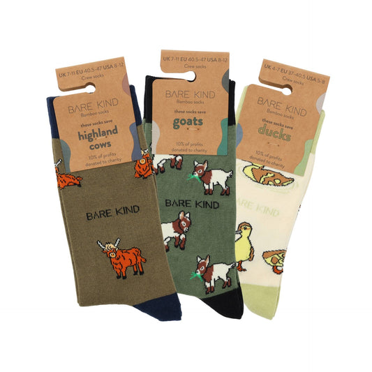 flat lays of highland cow, goat, ducklings bamboo socks