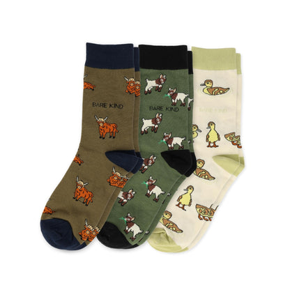 flat lays of highland cow, goat, ducklings bamboo socks