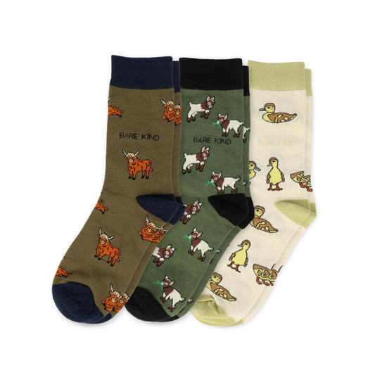 flat lays of highland cow, goat, ducklings bamboo socks