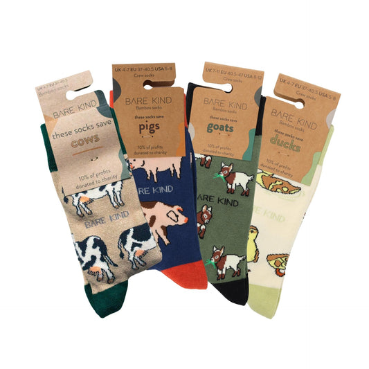 flat lays of cow, pig, goat, duckling bamboo socks