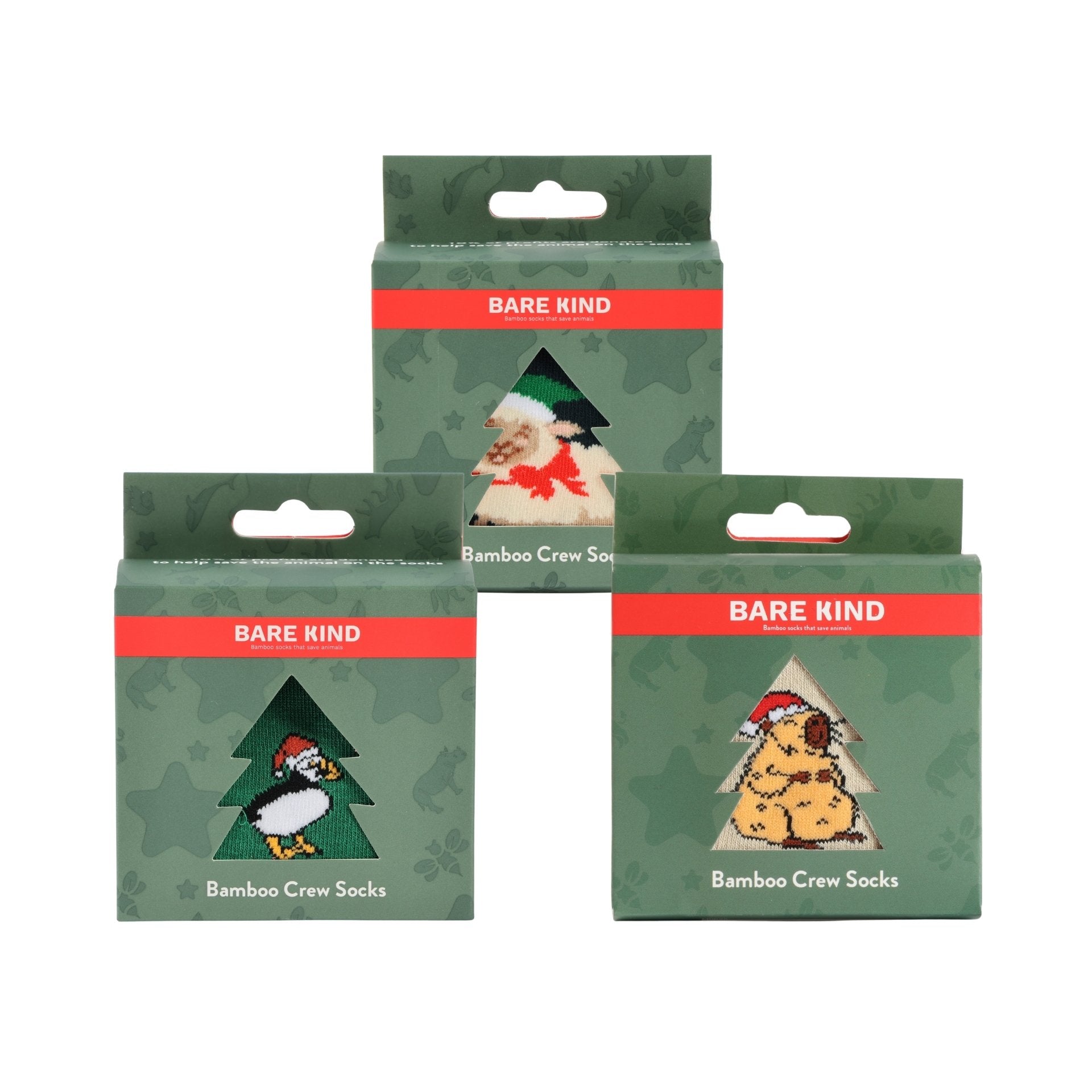Three green retail boxes of Bare Kind Bamboo Crew Socks arranged on a white background, each showing a different animal illustration under a red BARE KIND label.