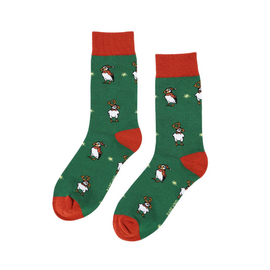 Green socks with red accents and puffin design on a white background