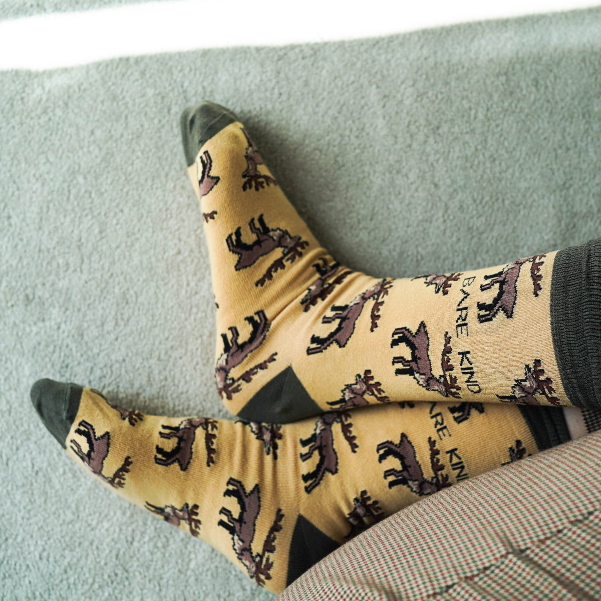 Model wearing highland deer bamboo socks