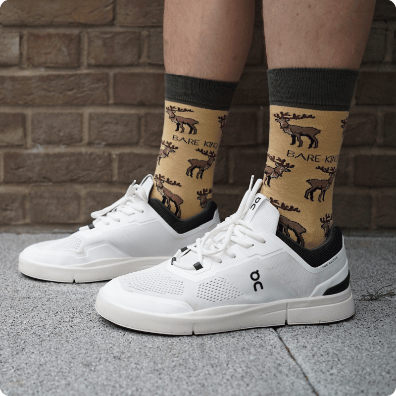 Model wearing Highland deer bamboo socks