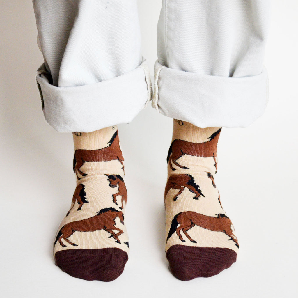 front view of standing model wearing brown horse socks made with bamboo fibre