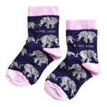 flat lay of purple and pink elephant bamboo socks for kids