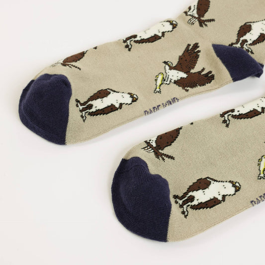 Beige Osprey bamboo socks on a white background