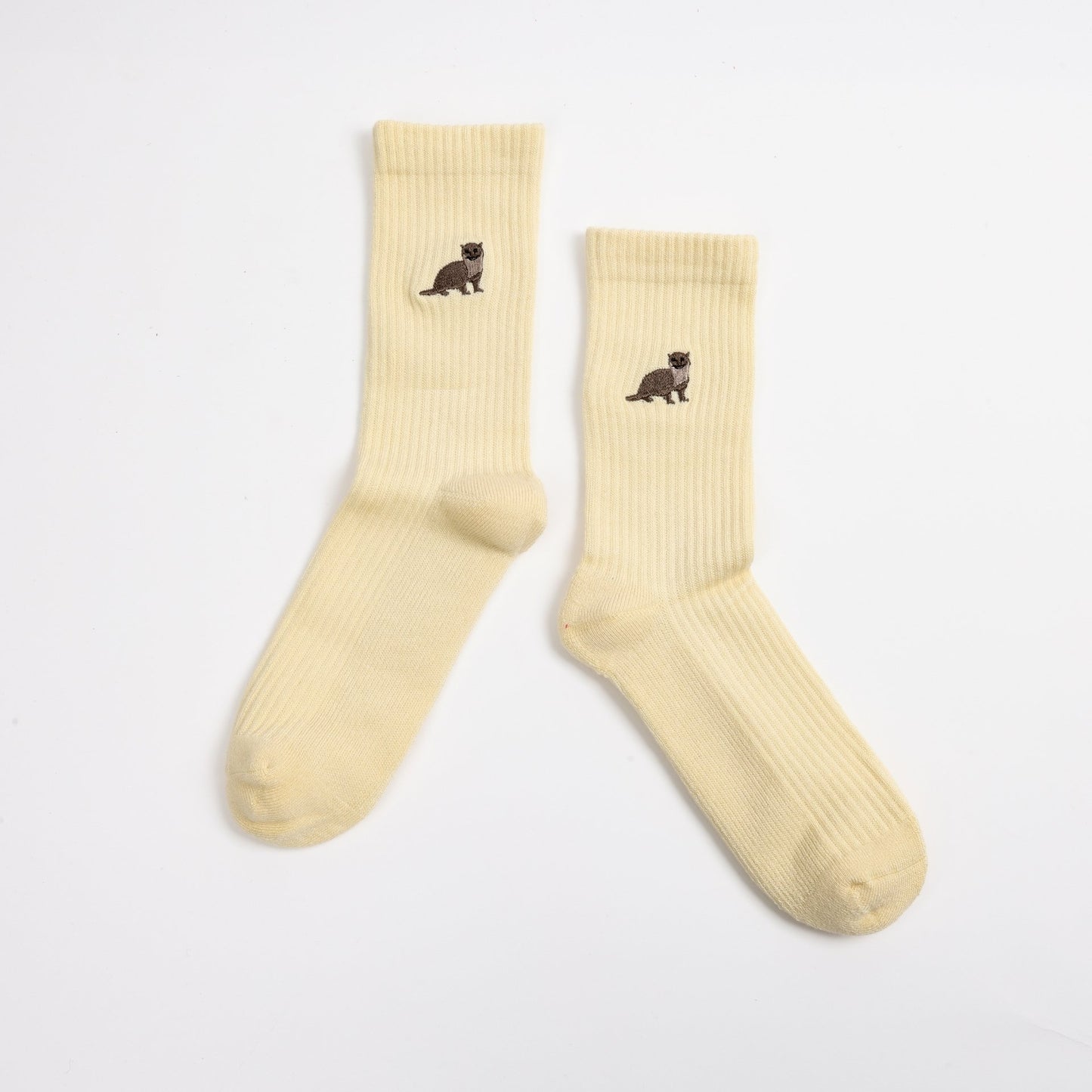 flat lays of yellow otter ribbed bamboo socks
