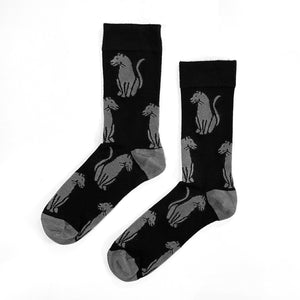 Flat lay of soft top black panther crew socks for adults