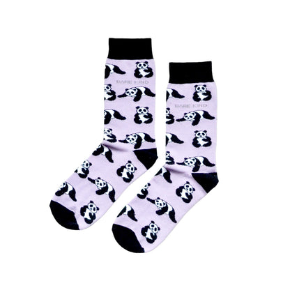 flat lay of lilac and black panda socks