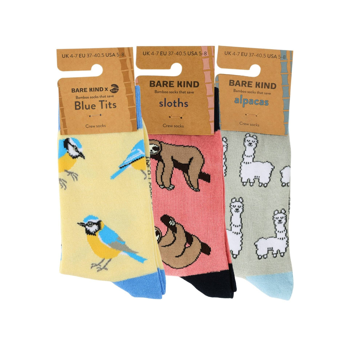Three pairs of Bare Kind crew socks displayed side-by-side on their cardboard hangers against a white background. 