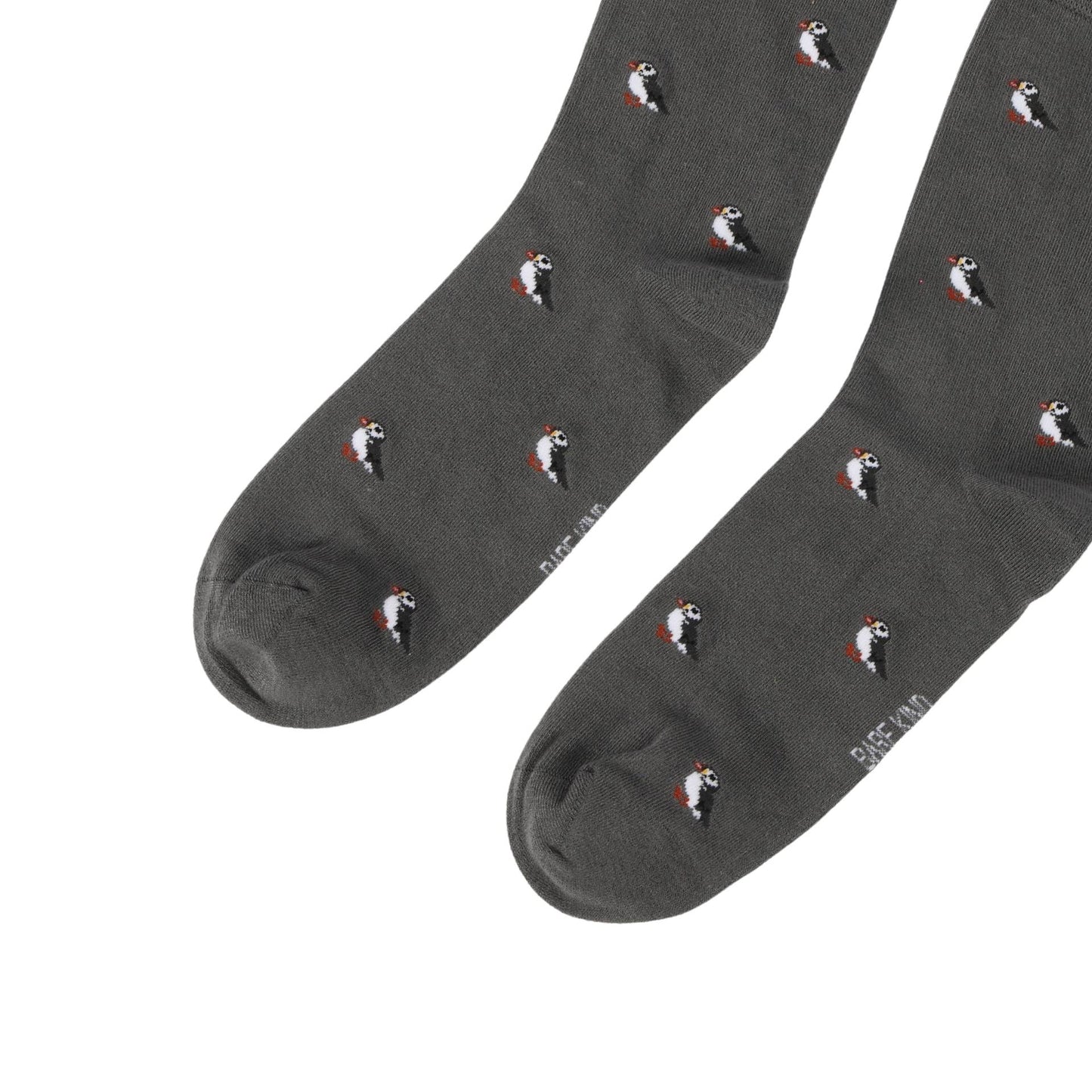 Dark gray socks with puffin pattern on a white background