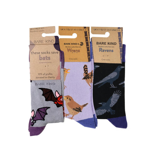 Three Bare Kind crew socks in a 3-pack, featuring bird and bat illustrations. 