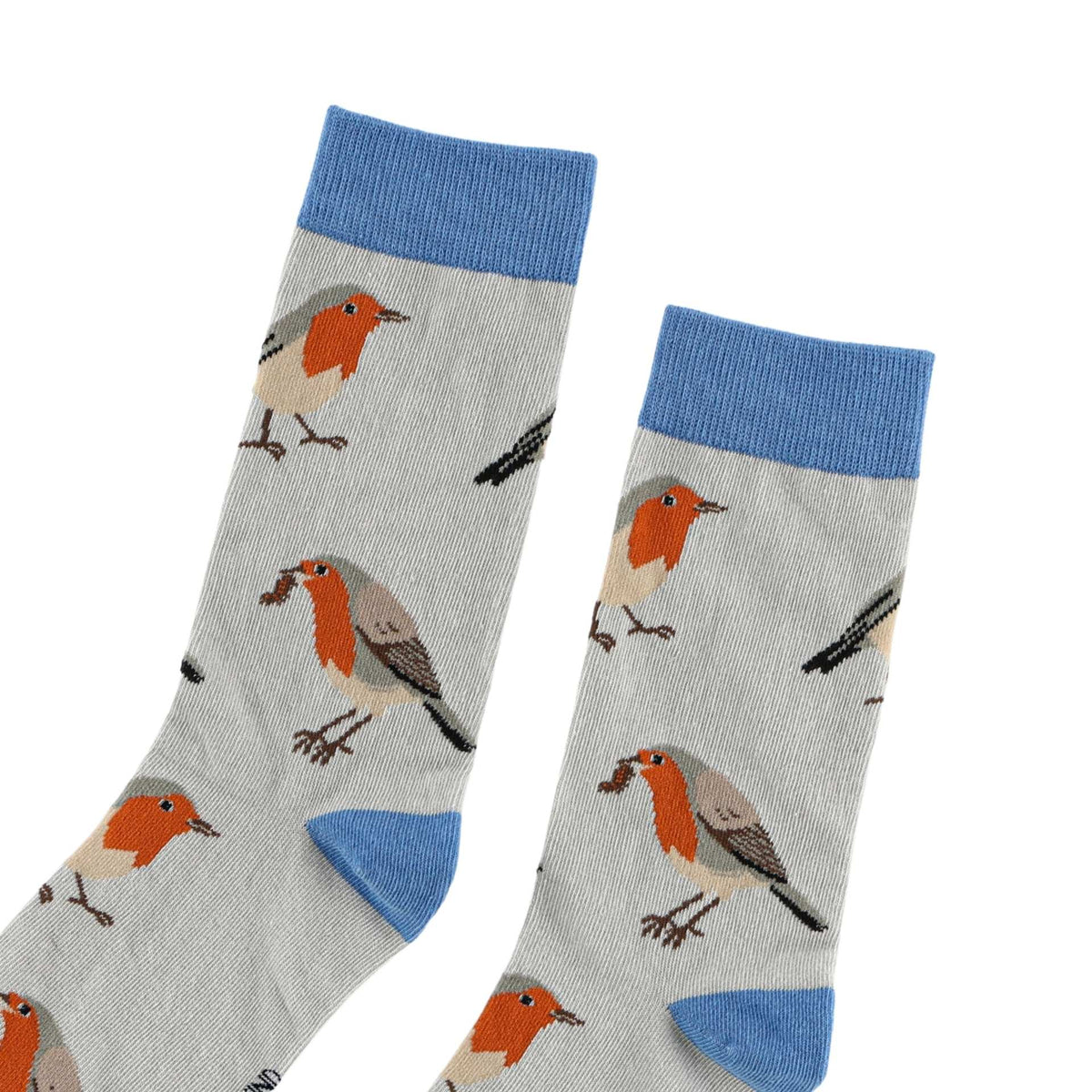 A pair of light gray crew socks with a repeating pattern of robin birds and blue ribbed cuffs, heels, and toes, shown on a plain white background.