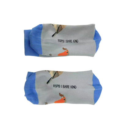 A pair of gray crew socks with blue cuffs and heels, featuring a printed bird design and the text 'RSPB I BARE KIND' on a white background.