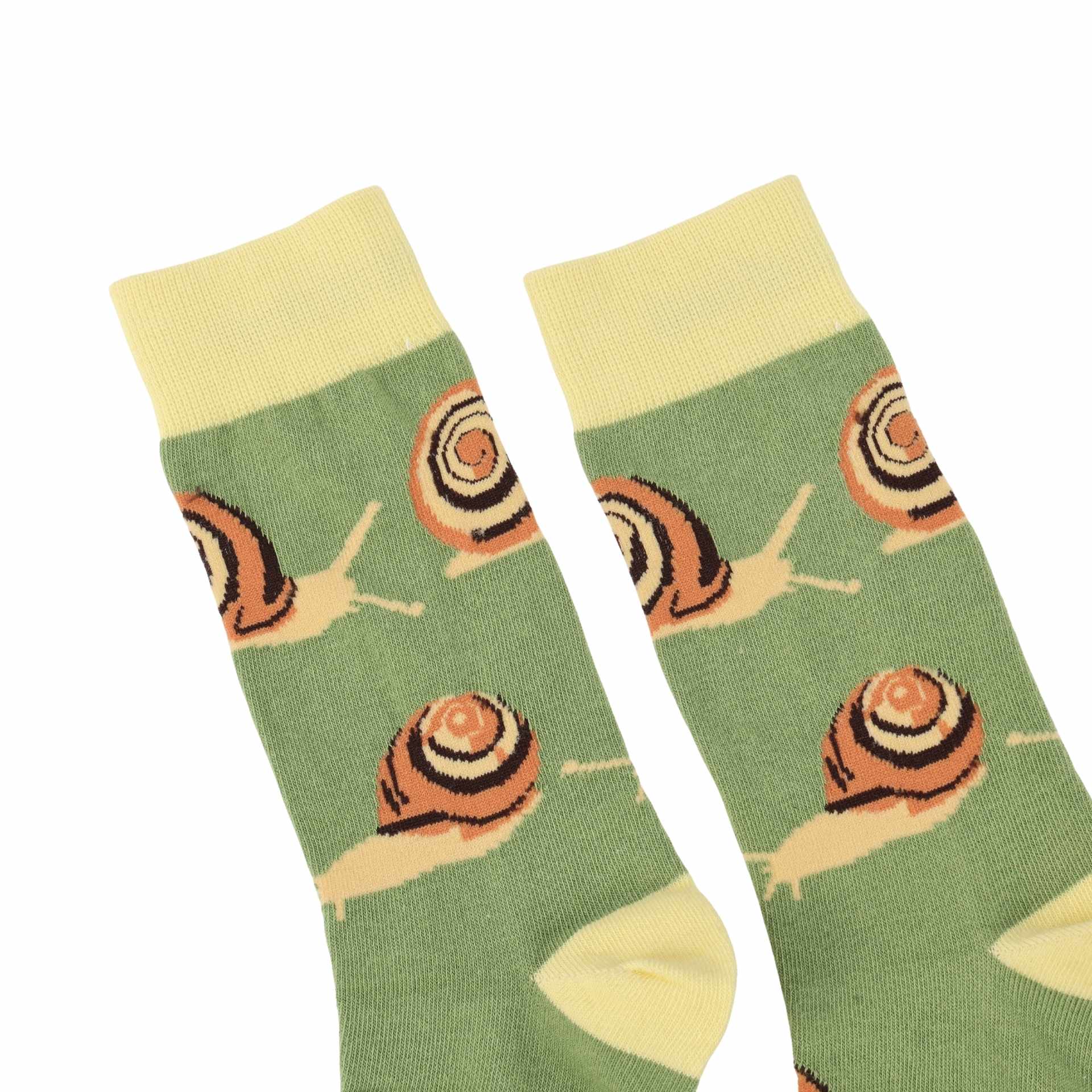 Green socks with snail pattern on a white background
