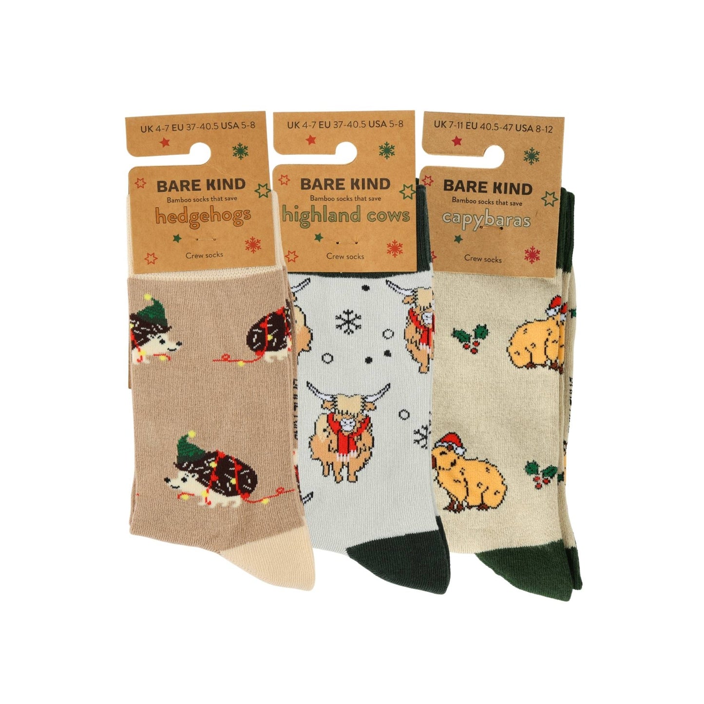 Three pairs of socks with animal designs on packaging labeled 'Bare Kind'.