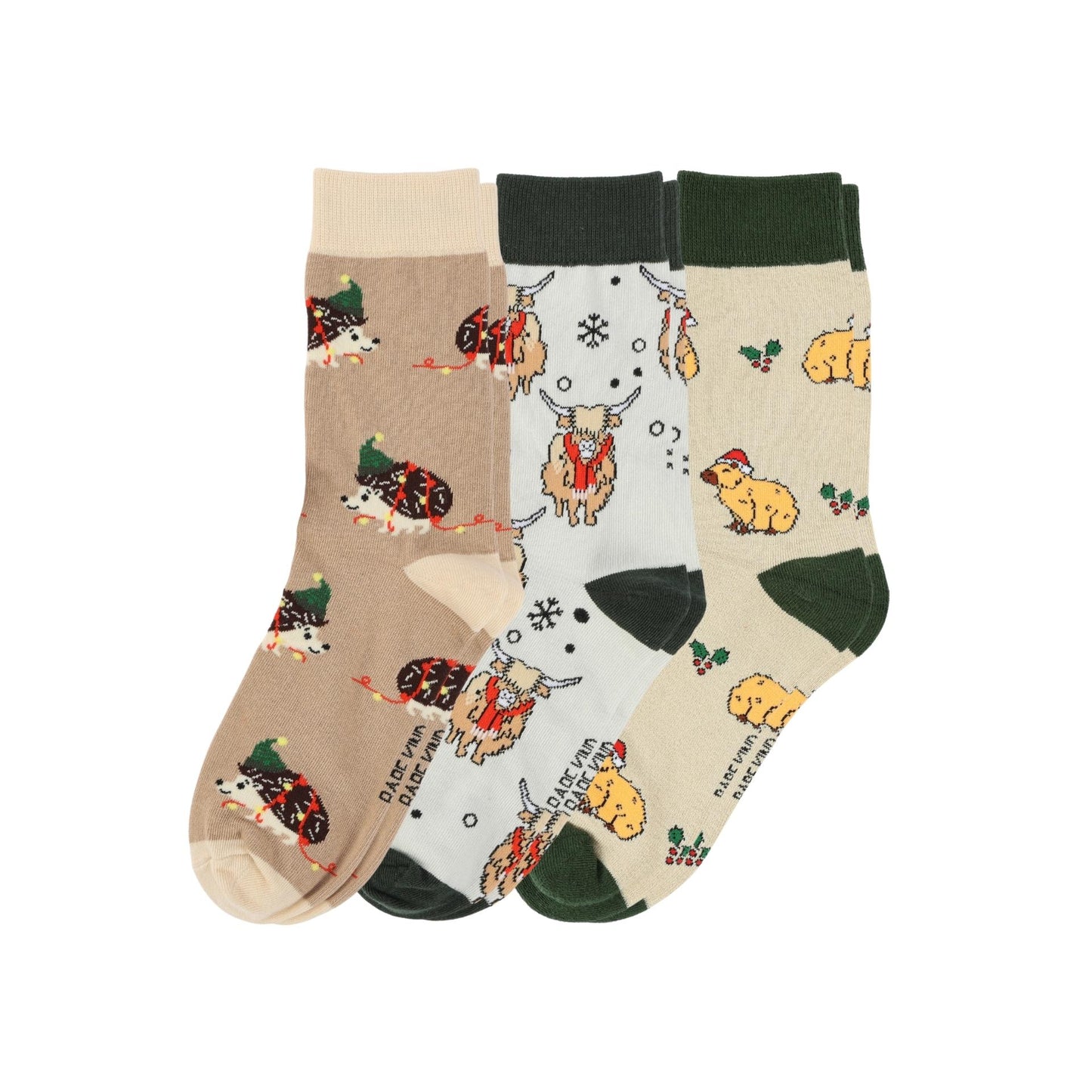 Three pairs of socks with animal patterns on a white background